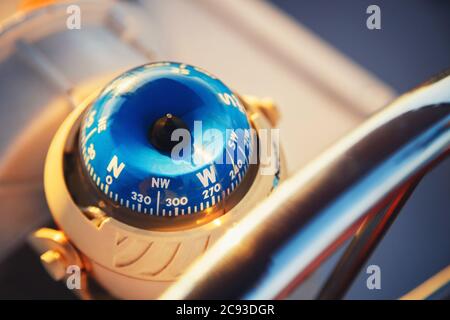 Close up of nautical compass on yacht Stock Photo