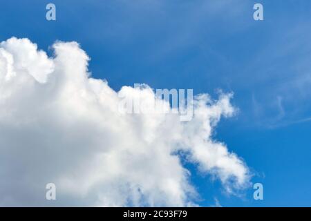 Large white cloud in the blue sky in the summer Stock Photo
