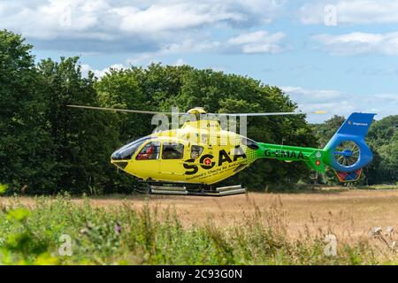 26 July 2020. Alvah Bridge, Banff, Aberdeenshire, Scotland, UK. This is one of the SCAA, Scottish Charity Air Ambulance departing from the Bridge of A Stock Photo