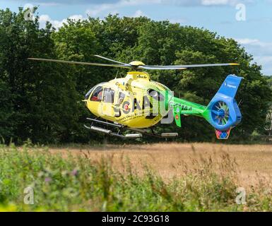 26 July 2020. Alvah Bridge, Banff, Aberdeenshire, Scotland, UK. This is one of the SCAA, Scottish Charity Air Ambulance departing from the Bridge of A Stock Photo