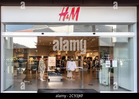 Huelva, Spain - July 27, 2020: H&M store in Holea Shopping center. H & M Hennes & Mauritz AB (H&M), is a Swedish clothing company. It sells fast fashi Stock Photo
