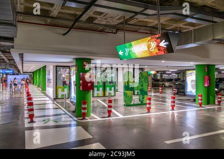 Huelva, Spain - July 27, 2020: Underground parking of Holea Shopping center. Holea is a major mall in Huelva it opened in late 2013. Holea is a outdoo Stock Photo