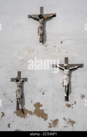 Crucifixes in an abandoned church in Uzupis an alternative neighbourhood in the old town of Vilnius, Lithuania. Stock Photo