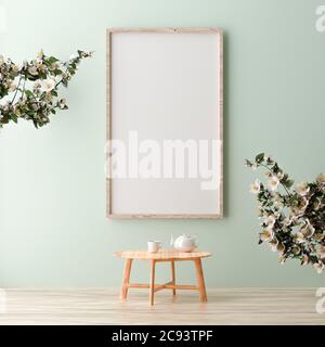 Blank vertical poster frame mock up standing on Green wall. One wooden frame isolated in Scandinavian interior. 3d rendering Stock Photo