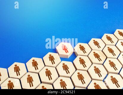 A person comes out of a group of people. Exit from mainstream society. Dismissal. Be different. Cooperation collaboration, joint efforts. Initiative. Stock Photo