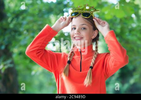 Girl wear fleece jumper for active leisure nature background, sunny day concept. Stock Photo