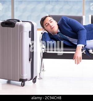 Businessman waiting at the airport for his plane in business class Stock Photo