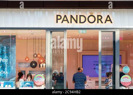 Huelva, Spain - July 27, 2020: Pandora store. Pandora is a Danish jewelry manufacturer and retailer founded in 1982 known for its customizable charm b Stock Photo