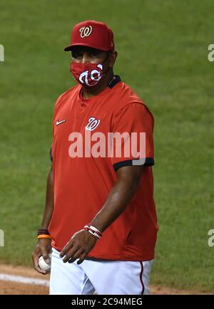 Washington Nationals manager Dave Martinez walks back to the dugout after a  pitching change during a baseball game against the Atlanta Braves early  Saturday, Aug. 14, 2021, in Washington. (AP Photo/Nick Wass