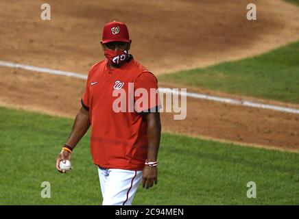 Washington Nationals manager Dave Martinez walks back to the dugout after a  pitching change during a baseball game against the Atlanta Braves early  Saturday, Aug. 14, 2021, in Washington. (AP Photo/Nick Wass