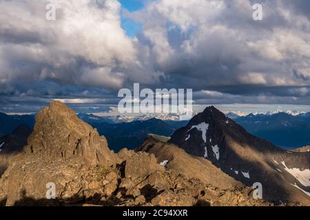 North Suicide Peak in shadows as heavy clouds move across the Chugach Stock Photo