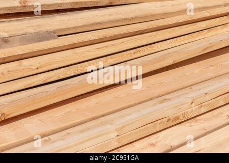 Stack of fresh construction boards or bars Stock Photo