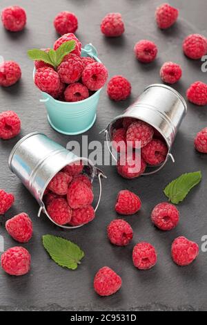 Ripe raspberries close up, sweet summer berry source of vitamins. Stock Photo