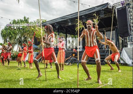 Traditional aboriginal dancers from Yarrabah in Queensland, Australia perform for tourists at the Indigenous art and culture festival in Cairns. Stock Photo