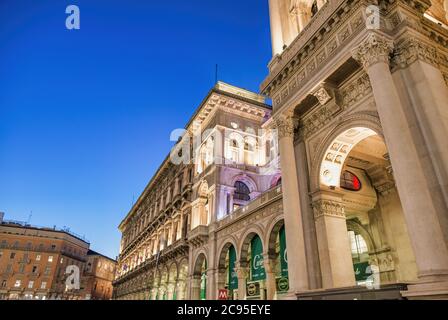 MILAN, ITALY - SEPTEMBER 2015: Exterior view of Gallery Vittorio Emanuele II at night Stock Photo