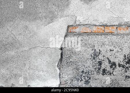 Corner background element of destroyed wall with cracks and scratches Stock Photo
