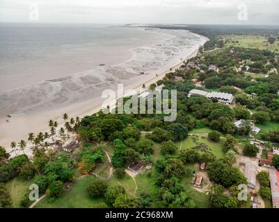 An aerial shot of Bagamoyo, Tanzania. Curve of Indian Ocean Beachline Coast with Vessels Stock Photo
