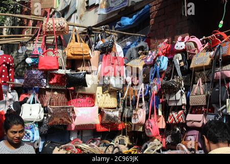 Kolkata, West Bengal/India - December 29, 2019: Variety of Bags selling on a open shop at a busy market, at Esplanade, Kolkata. Stock Photo