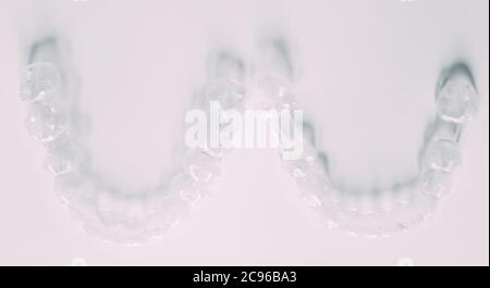 Top view of transparent aligners isolated on a white background Stock Photo