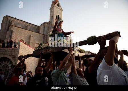 Procession of our lady of Zgharta for the Feast of the Assumption in Ehden, Lebanon. Stock Photo