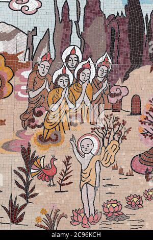 Ong Nui buddhist pagoda. Wall fresco.  The life of the Buddha. The birth of infant Siddhartha as a prince who pointing to the North, walked seven step Stock Photo