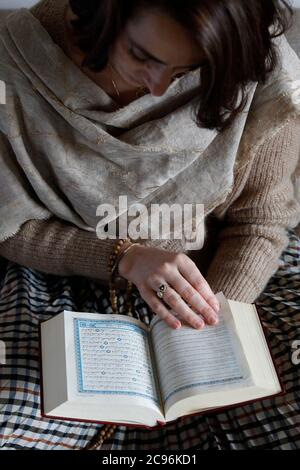 Kahina Bahloul, the first woman imam in France, reading the kuran in Paris. Stock Photo