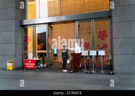 The body temperature check post on the entrance to business centre. Stock Photo