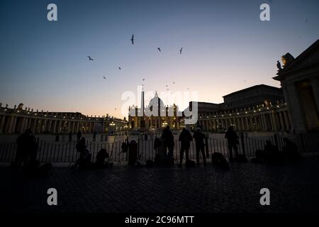 Pope Francis presides over Good Friday's Way of the Cross (Via Crucis) at St. Peter's Square during the lockdown aimed at curbing the spread of the CO Stock Photo