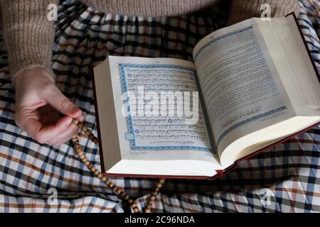 Kahina Bahloul, the first woman imam in France, reading the kuran in Paris. Stock Photo