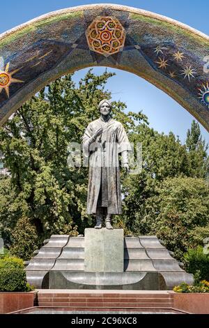 The arched Monument to Rudaki in Rudaki Park in Dushanbe Stock Photo