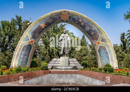 The arched Monument to Rudaki in Rudaki Park in Dushanbe Stock Photo