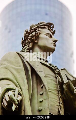 Schiller monument at the park of the Taunusanlage with Main Tower in the background, Germany, Hesse, Frankfurt am Main Stock Photo