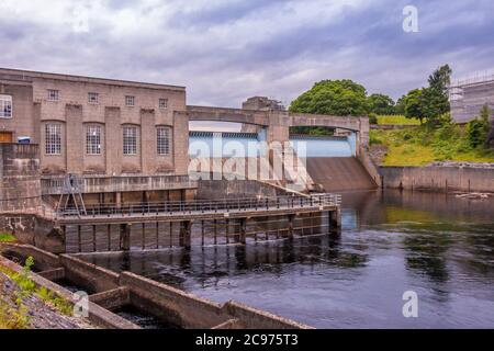 Pitlochry Dam, hydro electric power station and salmon ladder at twilight, Pitlochry, Perthshire, Scotland Stock Photo