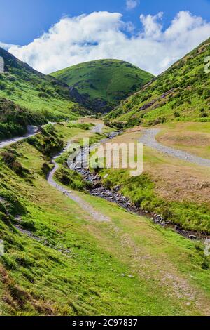 The footpath through Carding Mill Valley with Calf Ridge in the background, Long Mynd, Shropshire, England Stock Photo