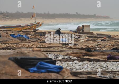 Artisanal fish processing site in Cayar, Senegal Stock Photo