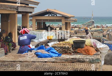 Artisanal fish processing site in Cayar, Senegal Stock Photo