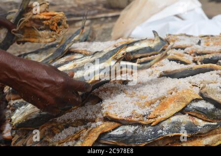 Artisanal fish processing site in Cayar, Senegal Stock Photo