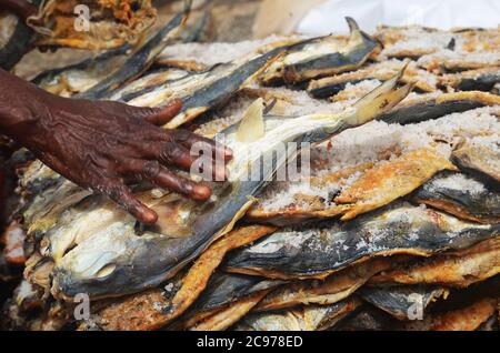 Artisanal fish processing site in Cayar, Senegal Stock Photo