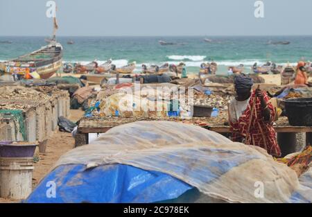 Artisanal fish processing site in Cayar, Senegal Stock Photo