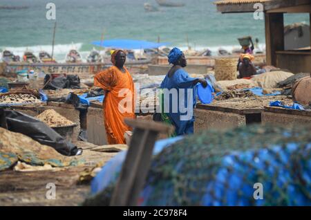 Artisanal fish processing site in Cayar, Senegal Stock Photo