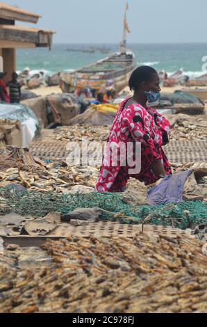 Artisanal fish processing site in Cayar, Senegal Stock Photo