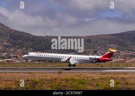 Los Rodeos, Tenerife/Canary islands; July 24 2020: Iberia regional Mitsubishi CRJ-1000, landing, in La Laguna city airport Stock Photo