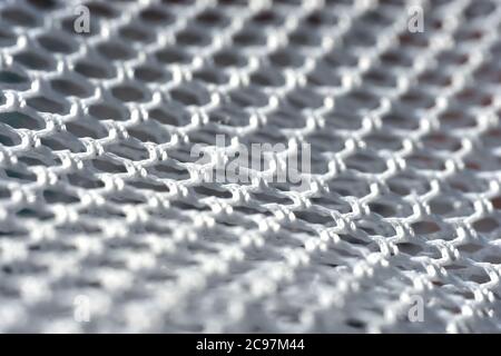 A simple white texture pattern of hexagons as a background Stock Photo