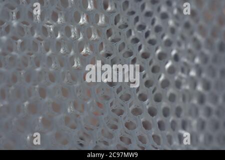 A simple white texture pattern of hexagons as a background Stock Photo