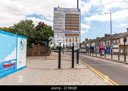 Town centre car parks matrix spaces sign on approach road Southend on Sea, Essex, UK. A13 London Road heading into town. Car park spaces information Stock Photo