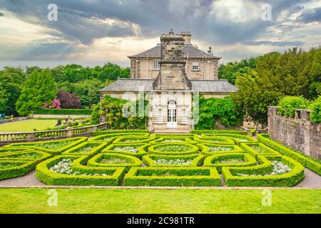 The east end of Pollok House with garden, the ancestral home of the Stirling Maxwell family, is located in Pollok Country Park, Glasgow, Scotland, UK Stock Photo