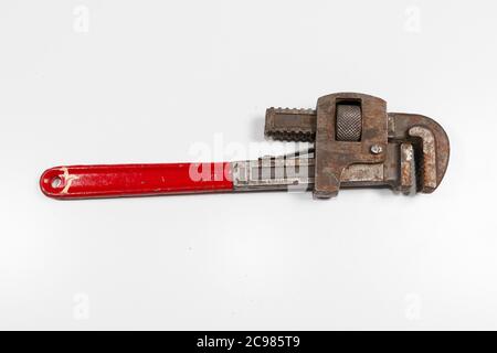 old Monkey wrench isolated on white background Stock Photo
