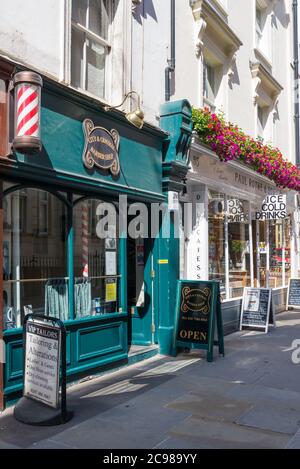 A row of small shops in Marylebone Lane, London, England, UK Stock Photo