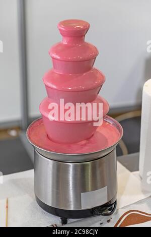 Pink Chocolate Fondue Fountain Multi Layer Tower Stock Photo