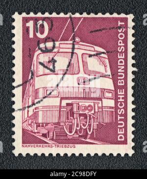 Postage stamp.  Electric locomotive,  inscription Deutsche  Bundespost, DDR, 1963 Stock Photo